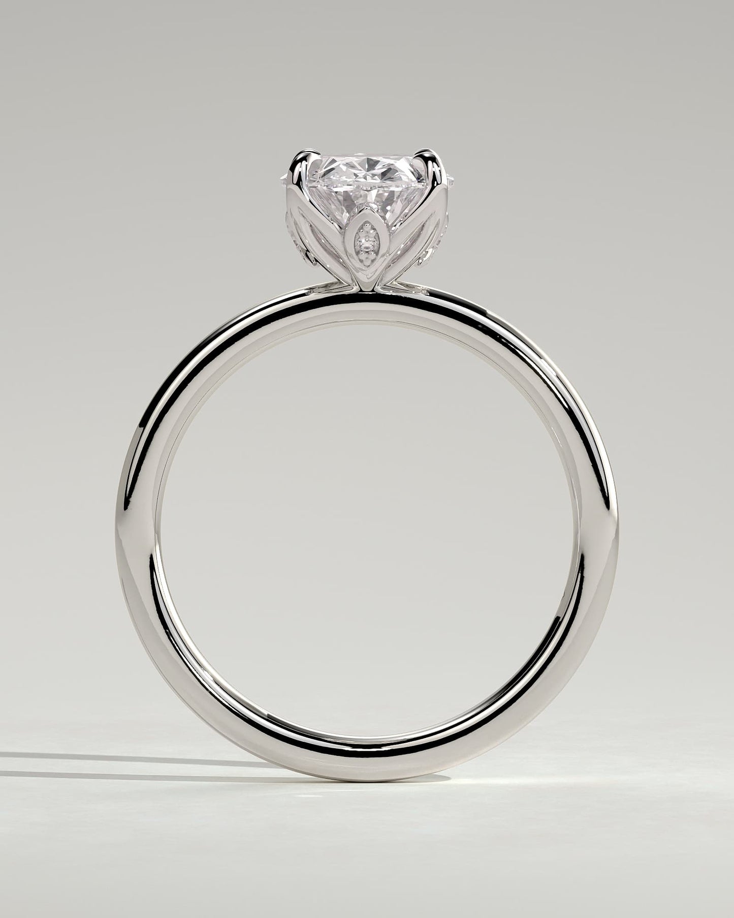 Aurelie - Oval Claw Solitaire with Petal Gallery and Accent Leaf Detail Engagement Ring - White Gold