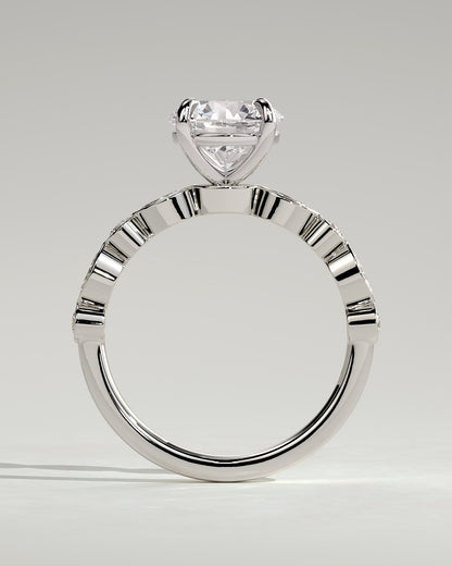 Cartia - Round Claw Solitaire with Round-Marquise Bezel Accent Stones Engagement Ring - White Gold
