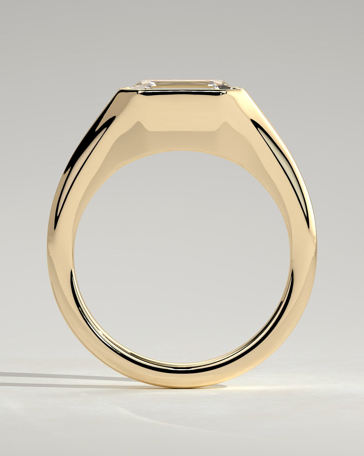Montanah - Emerald East West Bezel Solitaire with Signet Band Engagement Ring - Yellow Gold