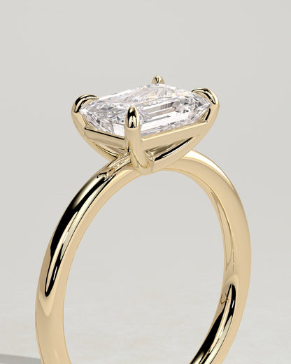 Debbie - Emerald East West Claw Solitaire Engagement Ring - Yellow Gold