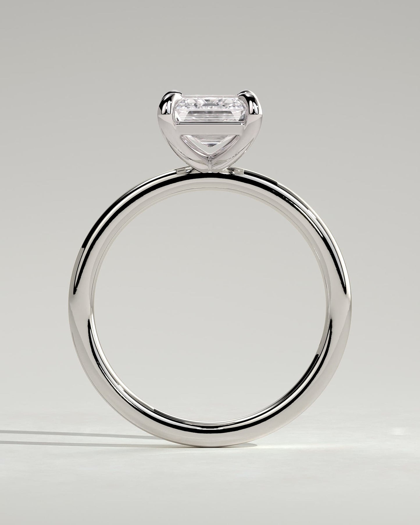 Alina - Emerald Claw Solitaire Engagement Ring - Platinum