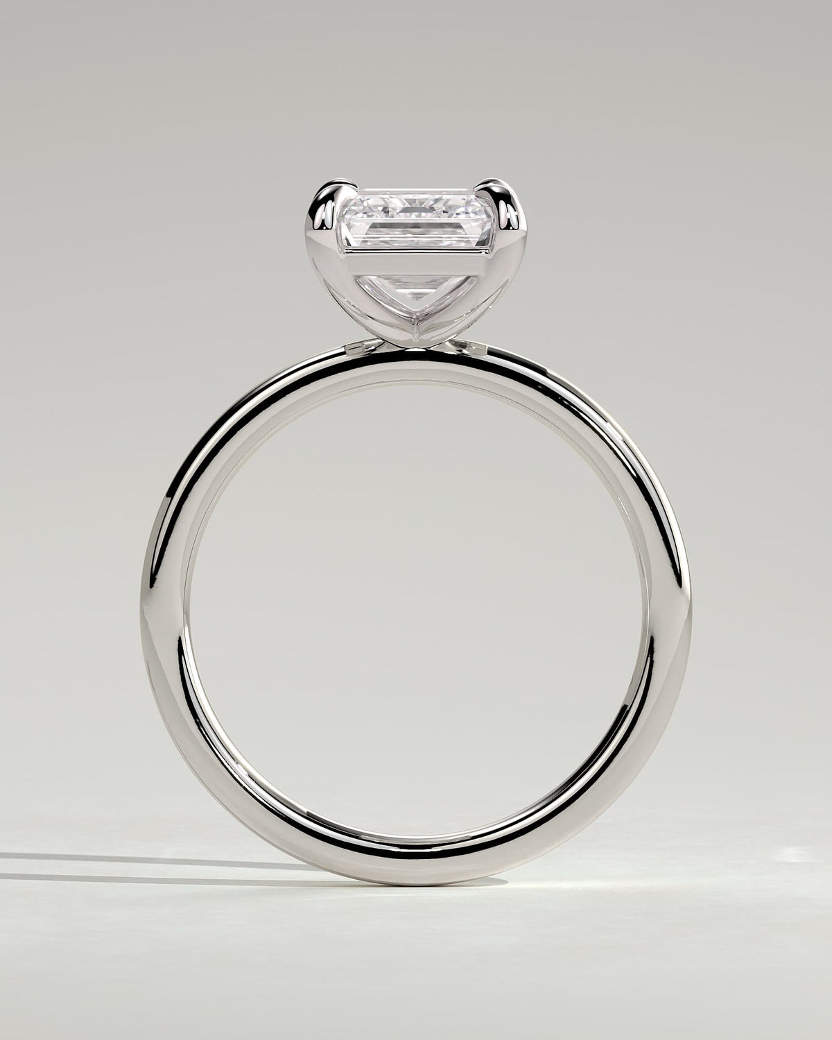 Alina - Emerald Claw Solitaire Engagement Ring - Platinum