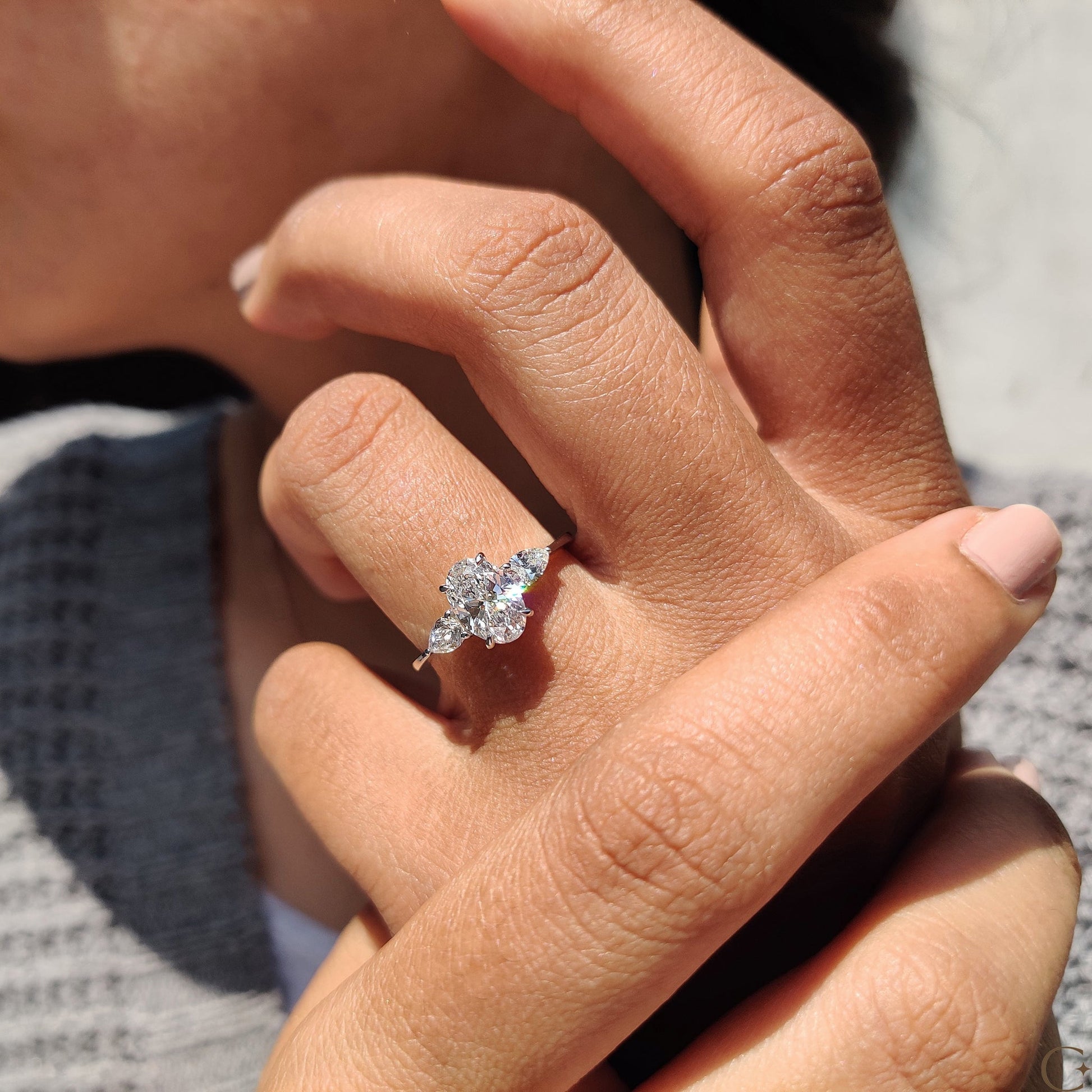 3 Stone Engagement Ring With Oval and Pear Cut Diamond