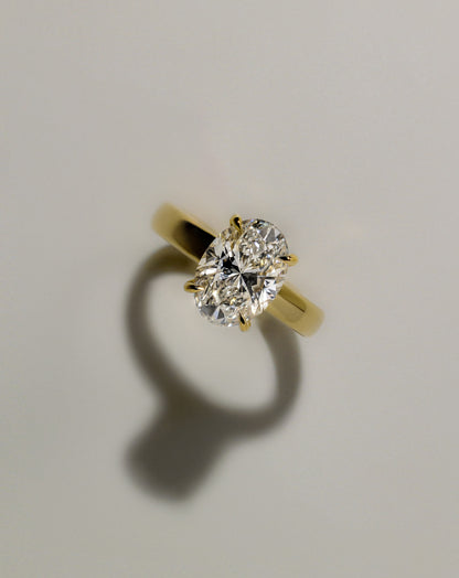 Bronte - Oval Claw Solitaire with Cigar Band and Hidden Halo Engagement Ring - Yellow Gold