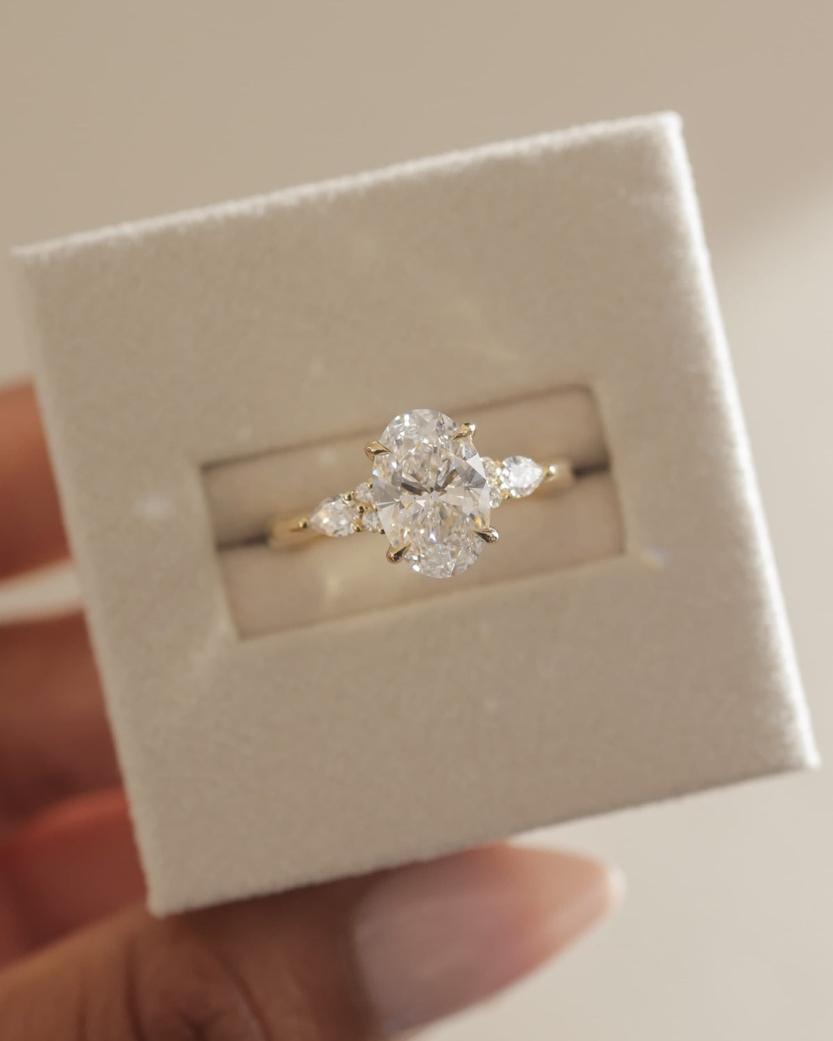 Sheridan - Oval Claw Solitaire with Pear Accents and Round Shoulder Stones Engagement Ring - Platinum