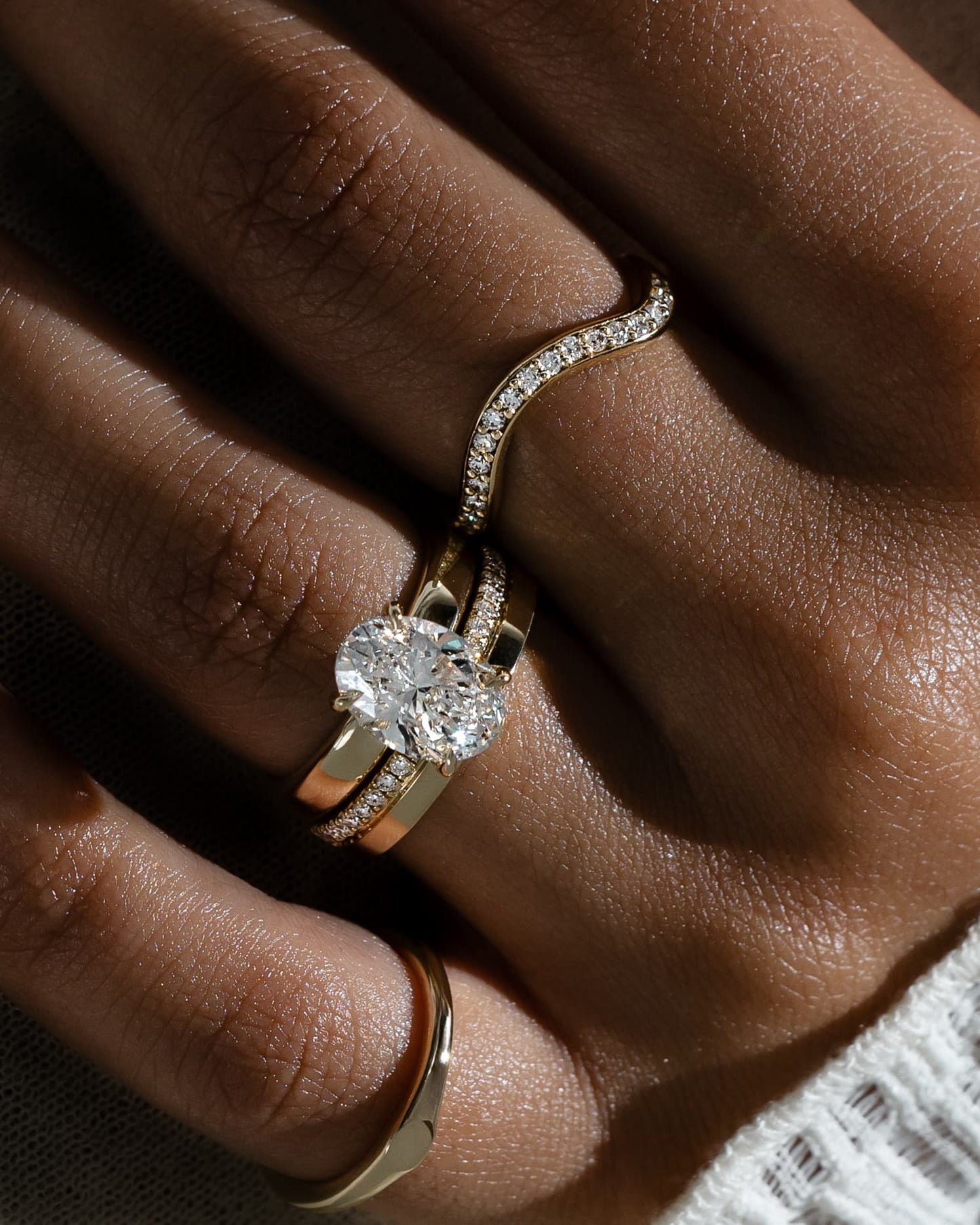 Bronte - Oval Claw Solitaire with Cigar Band and Hidden Halo Engagement Ring - Yellow Gold