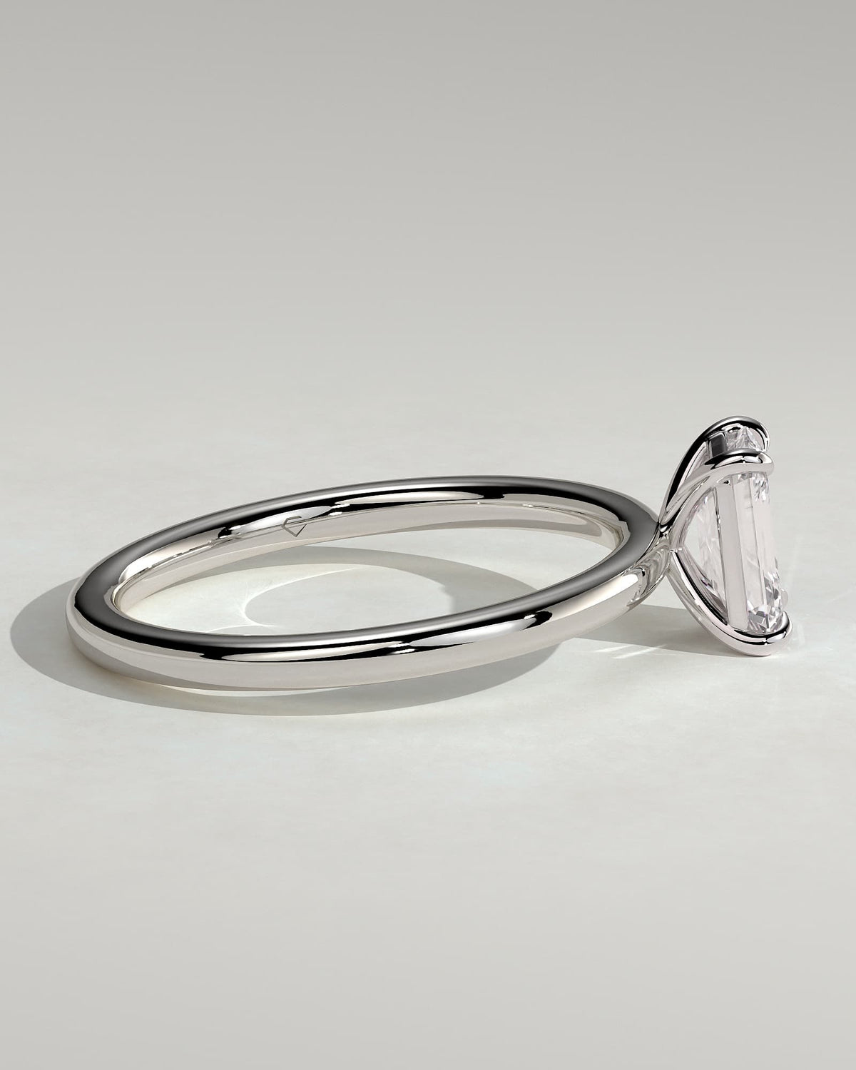Alina - Emerald Claw Solitaire Engagement Ring - Platinum