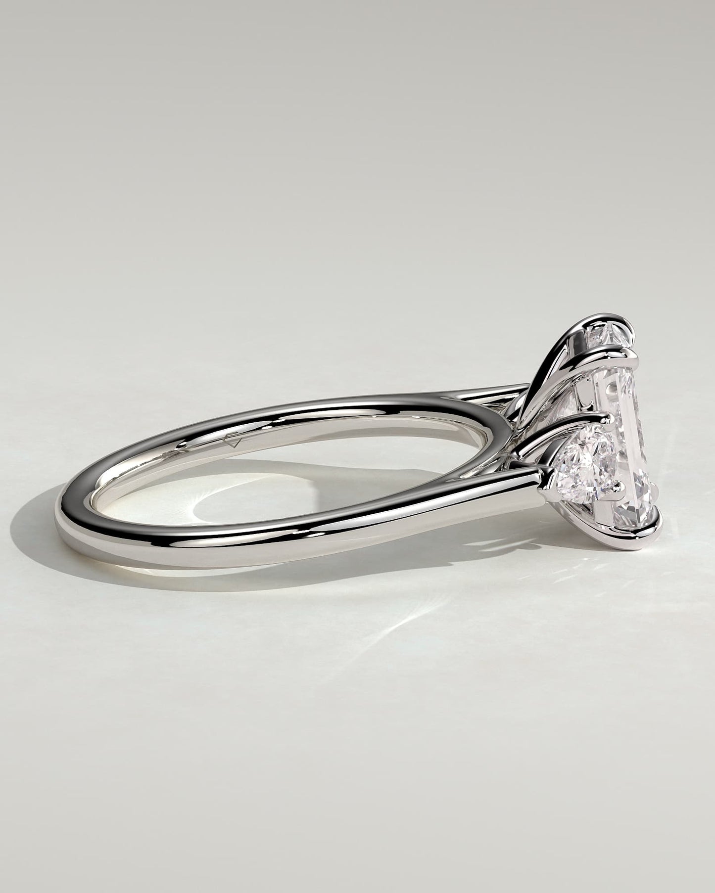 Davina - Emerald Claw Trilogy with Pear Side Stones and Cathedral Setting Engagement Ring - White Gold