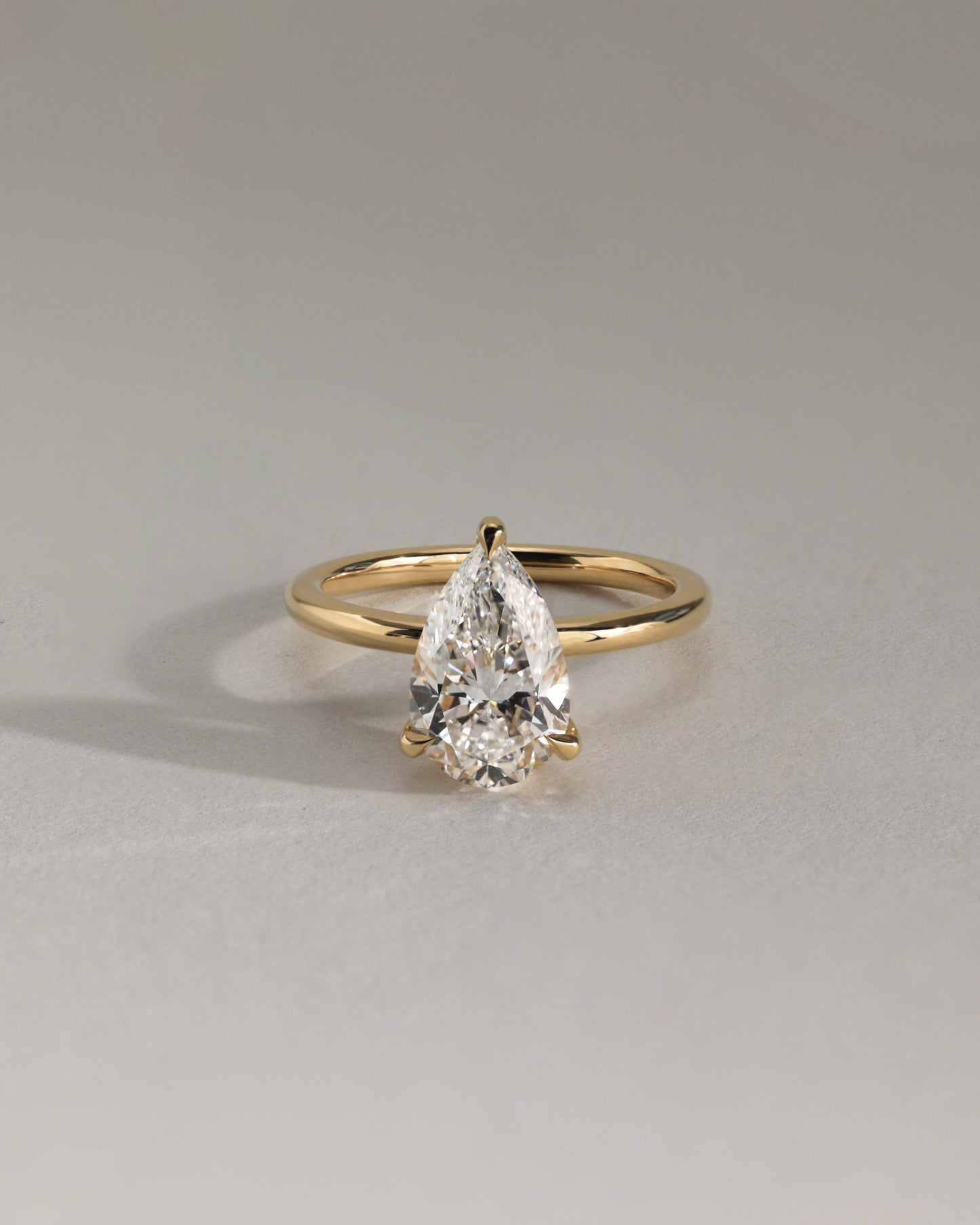 Amy - Pear Claw Solitaire Engagement Ring - Rose Two-Tone - Lifestyle