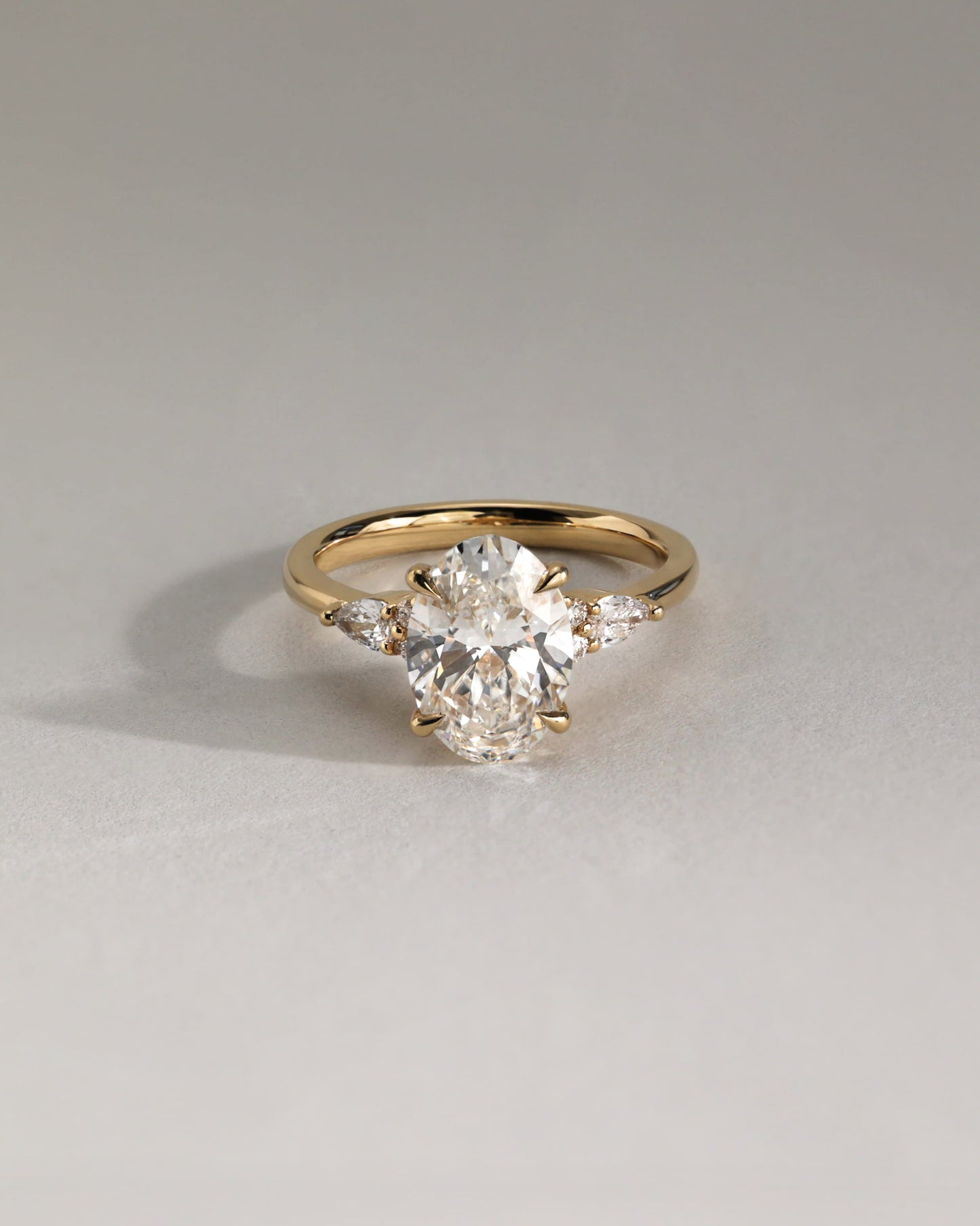 Sheridan - Oval Claw Solitaire with Pear Accents and Round Shoulder Stones Engagement Ring - White Gold