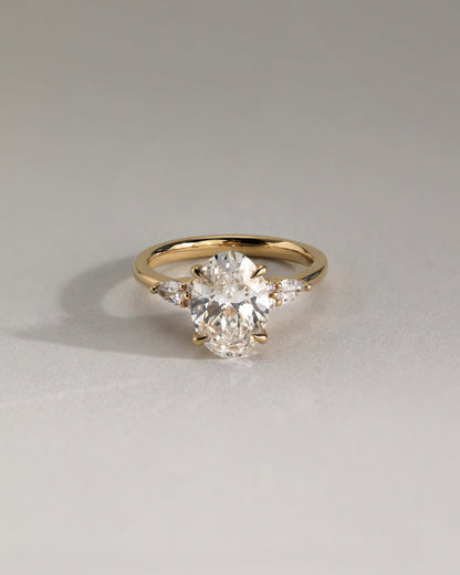 Sheridan - Oval Claw Solitaire with Pear Accents and Round Shoulder Stones Engagement Ring - White Gold