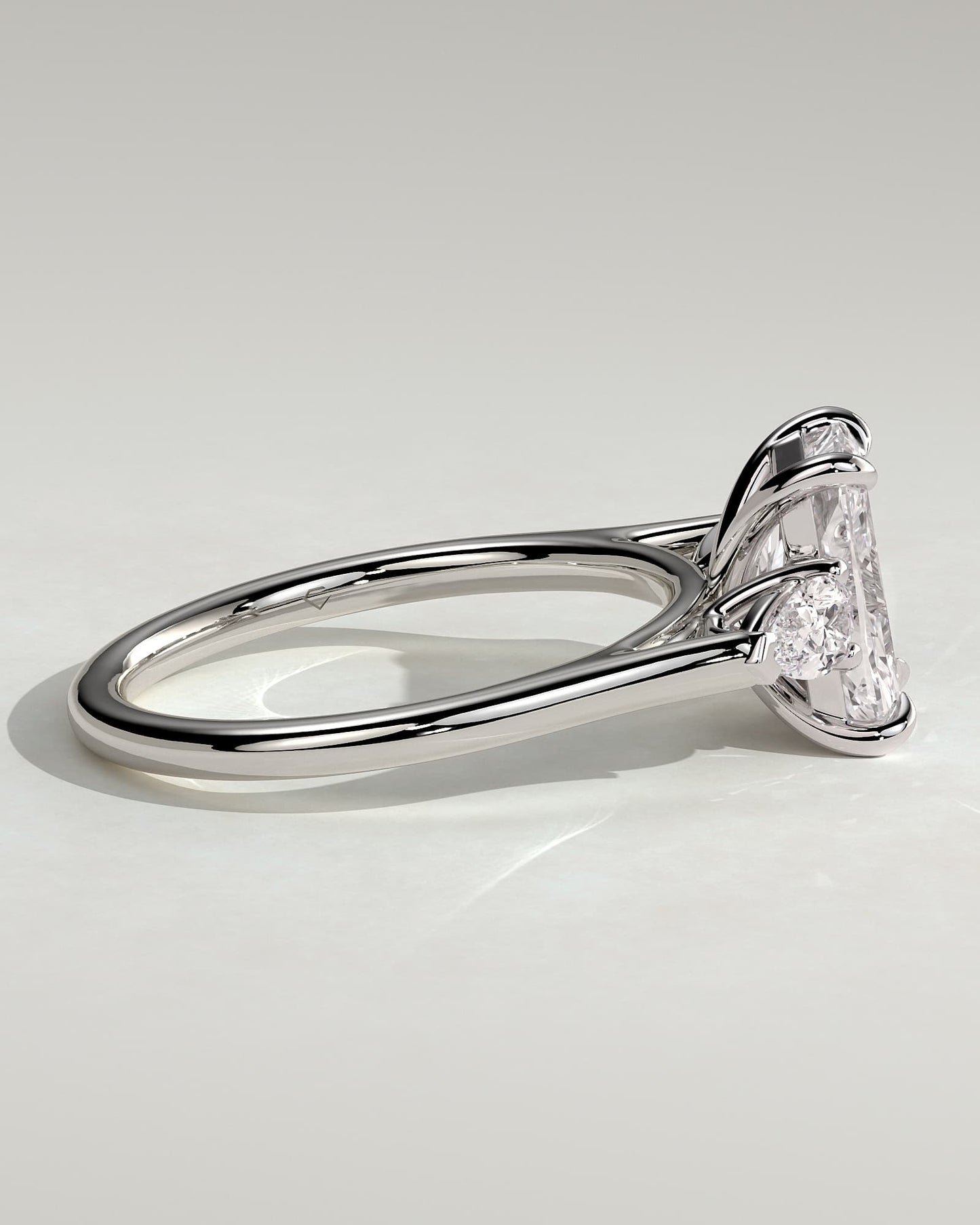 Jasmine - Radiant Claw Trilogy with Pear Side Stones and Cathedral Setting Engagement Ring - Platinum