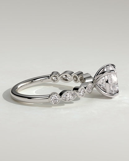 Cartia - Round Claw Solitaire with Round-Marquise Bezel Accent Stones Engagement Ring - Platinum