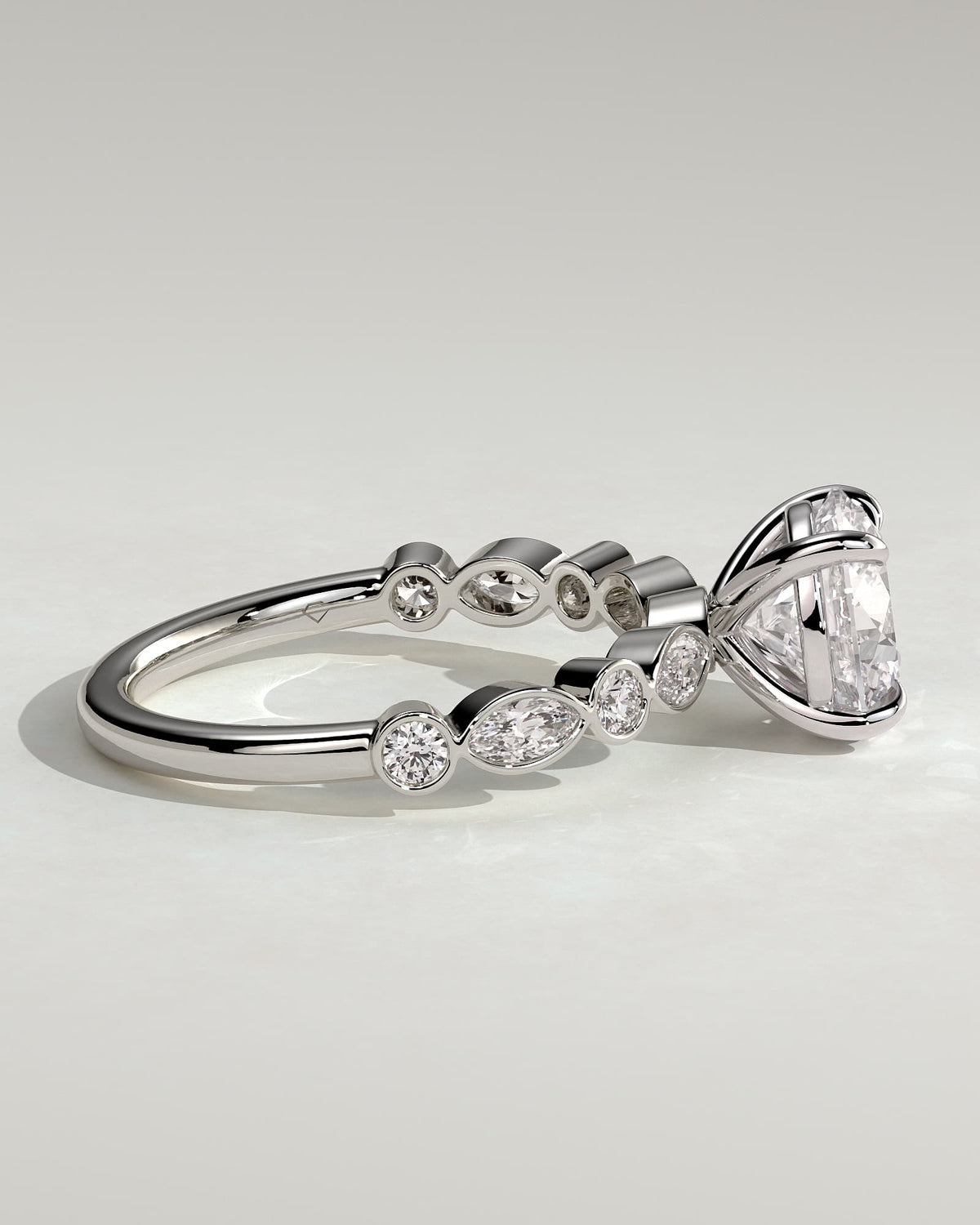 Cartia - Round Claw Solitaire with Round-Marquise Bezel Accent Stones Engagement Ring - White Gold