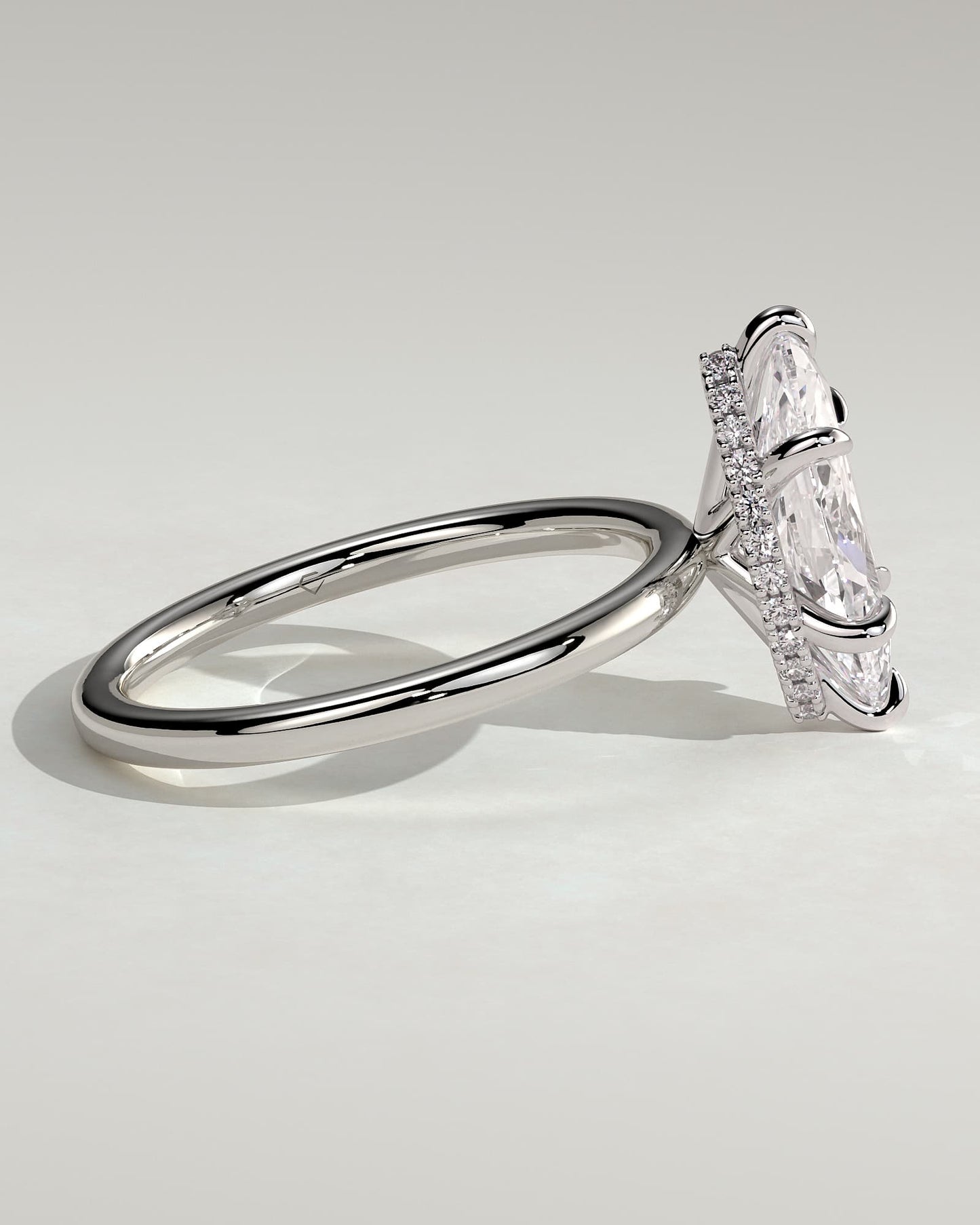 Claire - Marquise Claw Solitaire with Wrap Around Hidden Halo Engagement Ring - White Gold
