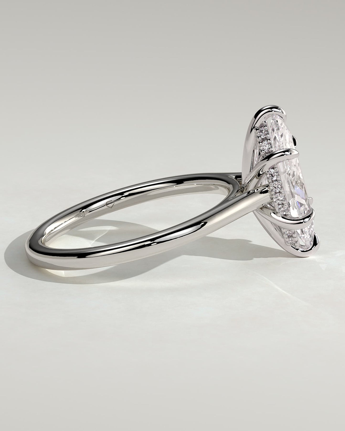 Jenna - Marquise Claw Solitaire with Hidden Halo and Cathedral High Setting Engagement Ring - White Gold