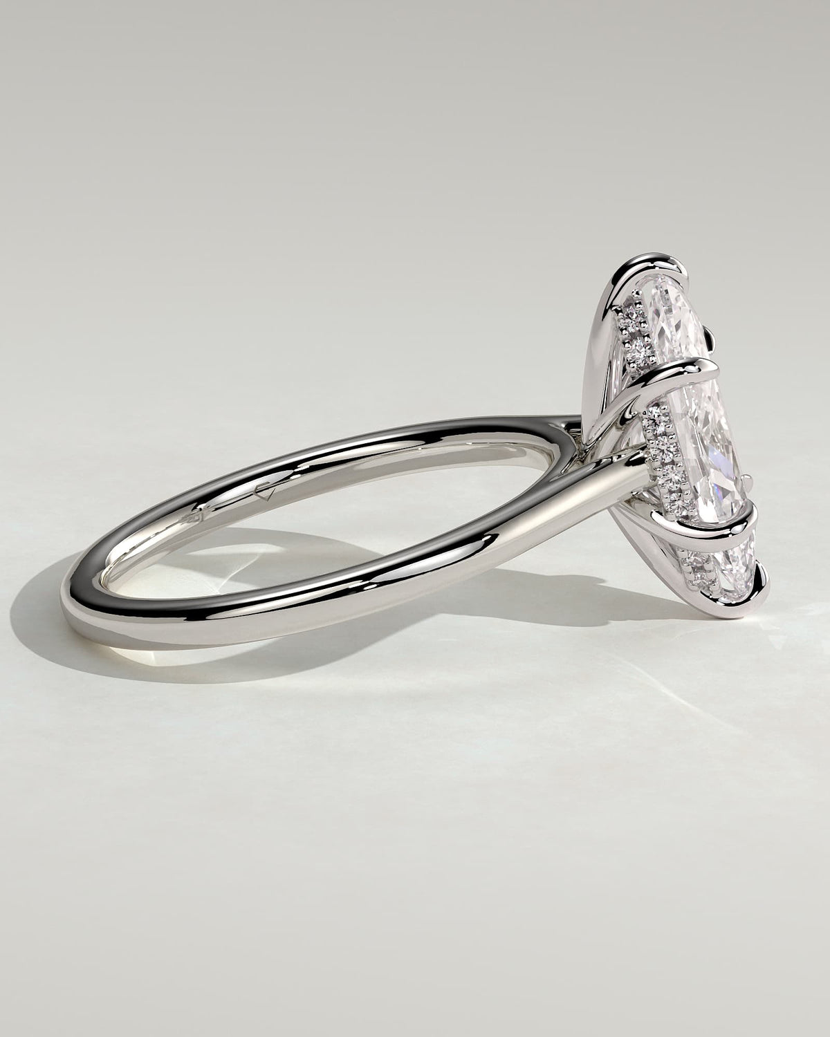 Jenna - Marquise Claw Solitaire with Hidden Halo and Cathedral High Setting Engagement Ring - Platinum
