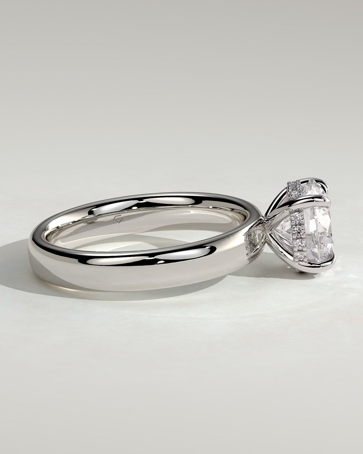 Kylie - Statement Round Claw Solitaire with Cigar Band and Hidden Halo Engagement Ring - Platinum