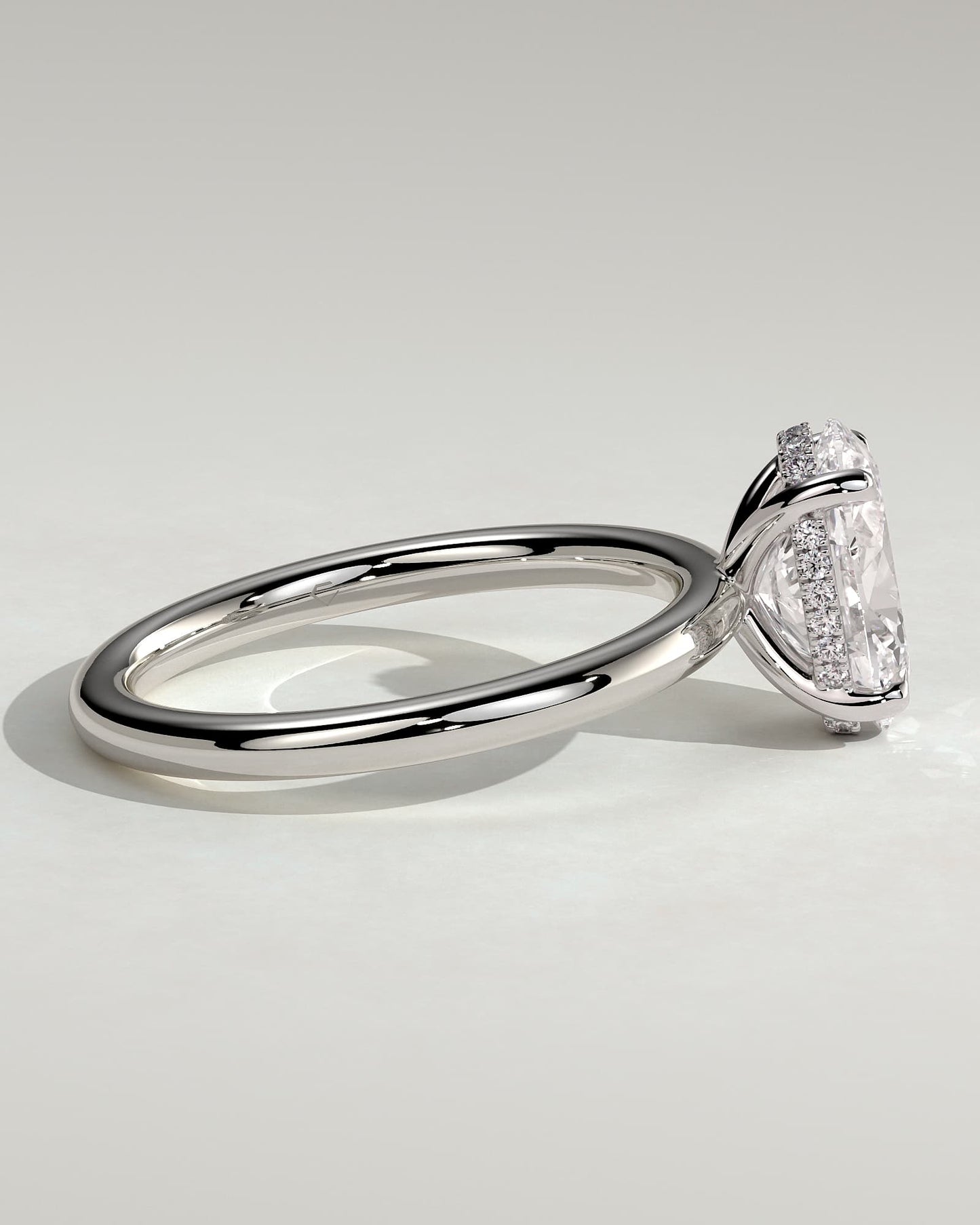 Emma - Classic Oval Claw Solitaire with Hidden Halo Engagement Ring - Platinum