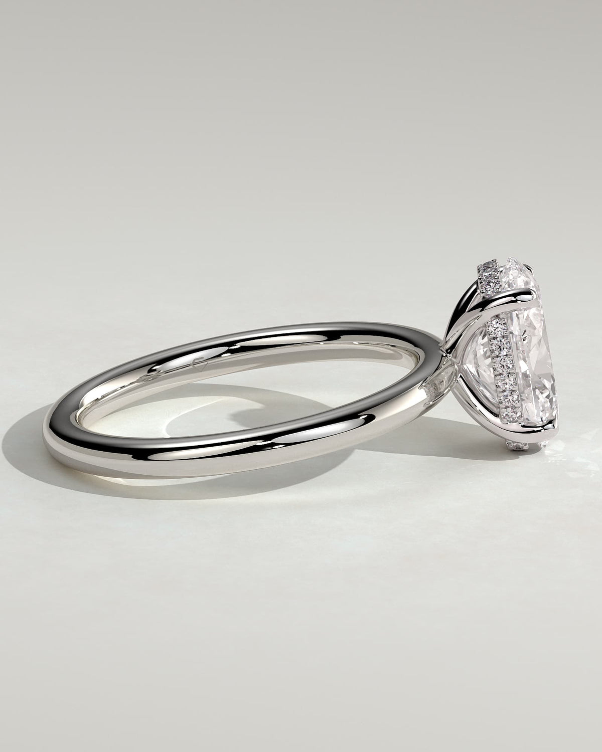 Emma - Classic Oval Claw Solitaire with Hidden Halo Engagement Ring - White Gold