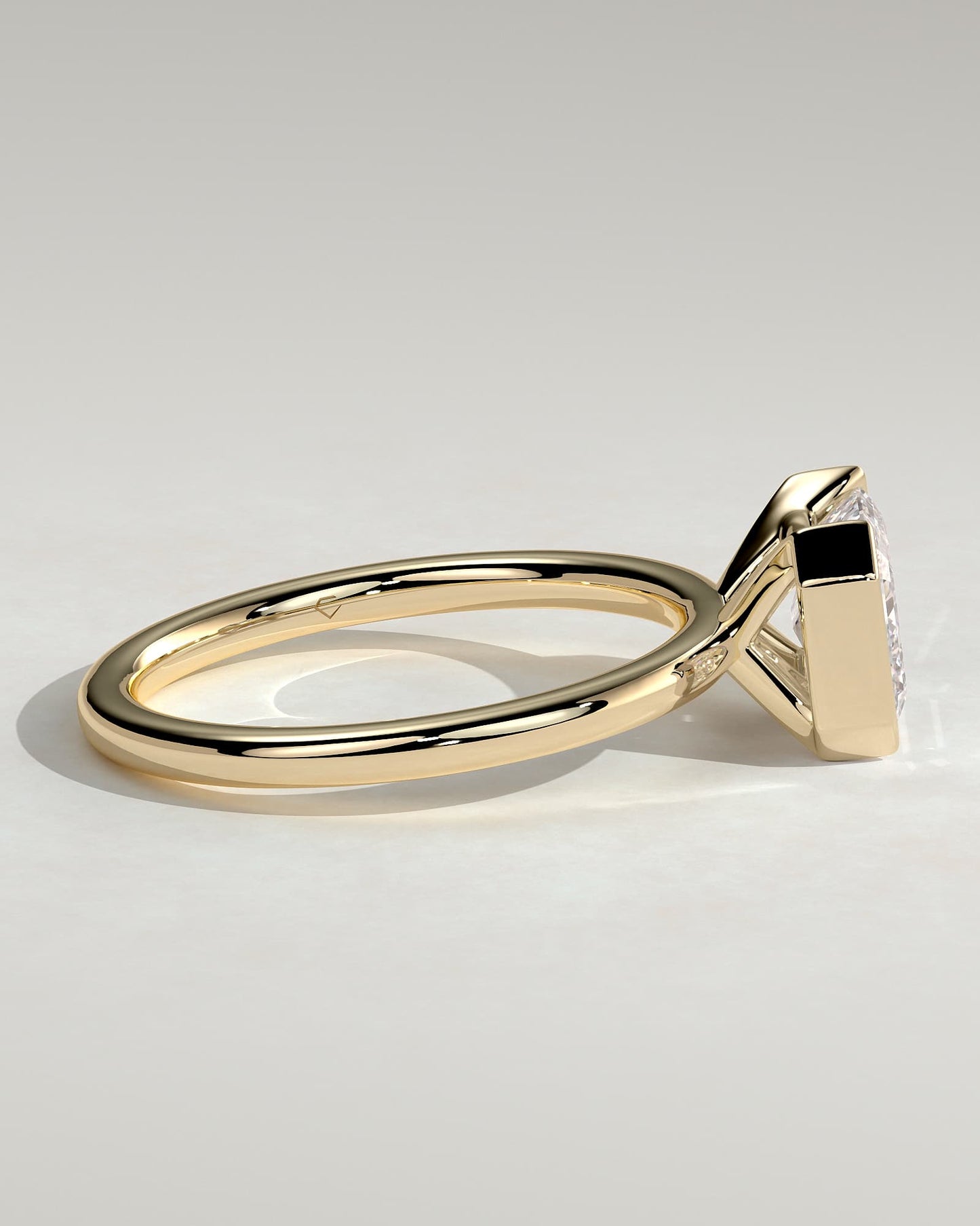 Jodie - Emerald East West Half Bezel Solitaire Engagement Ring - Yellow Gold