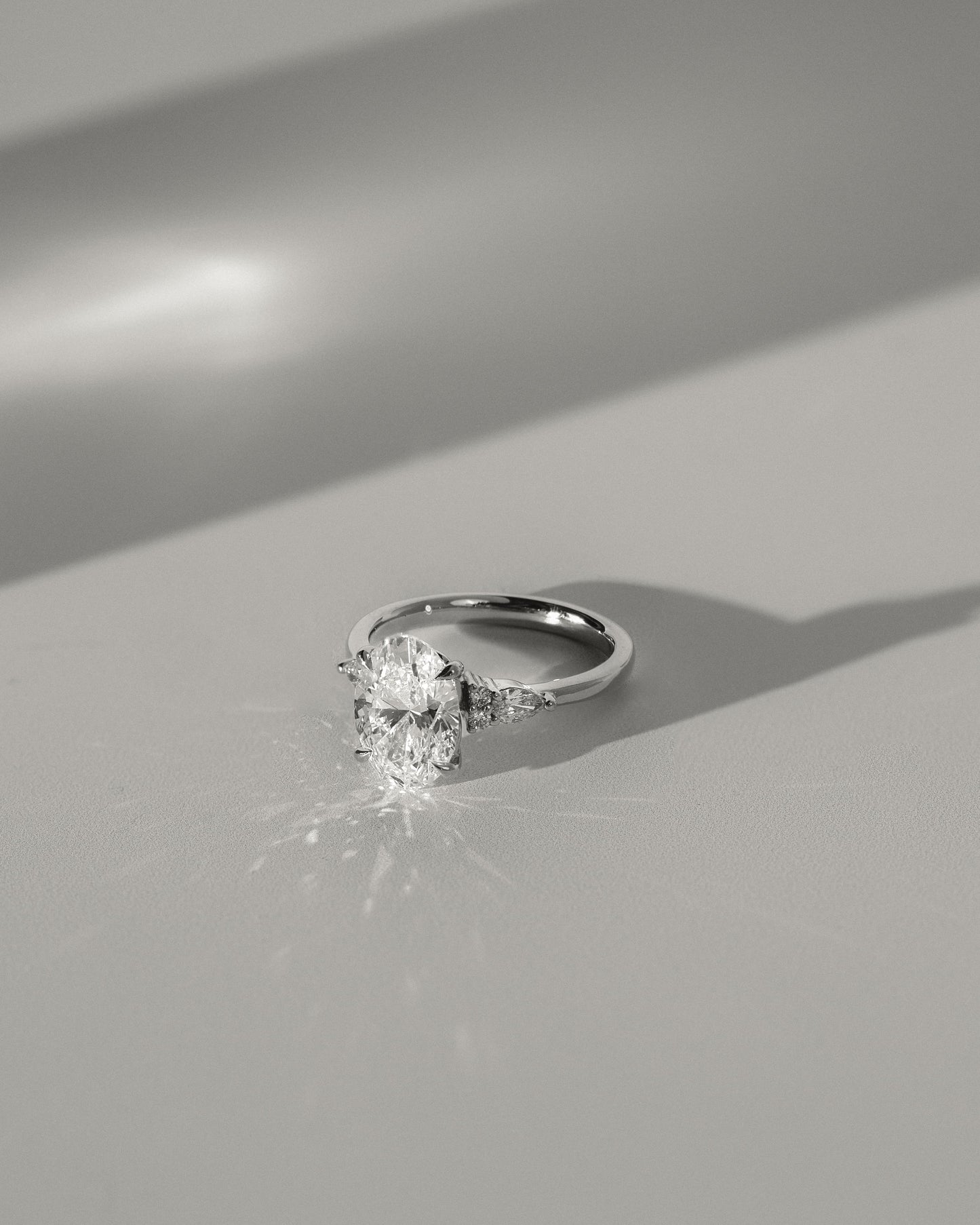 Sheridan - Oval Claw Solitaire with Pear Accents and Round Shoulder Stones Engagement Ring - Rose Two-Tone
