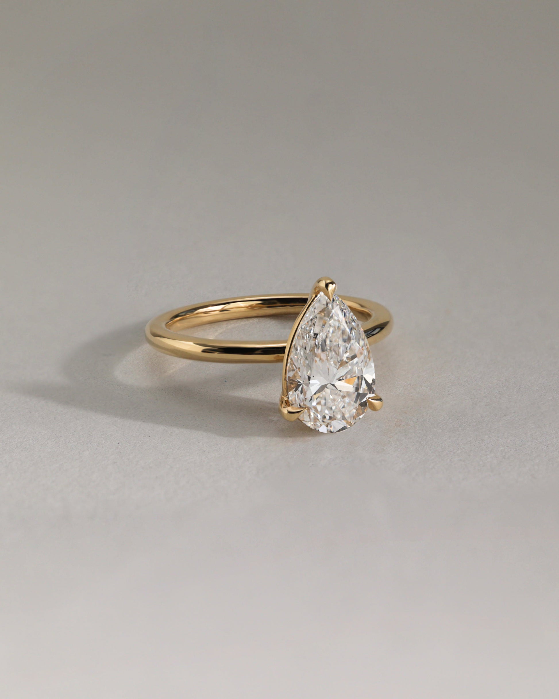 Amy - Pear Claw Solitaire Engagement Ring - Rose Two-Tone - Lifestyle
