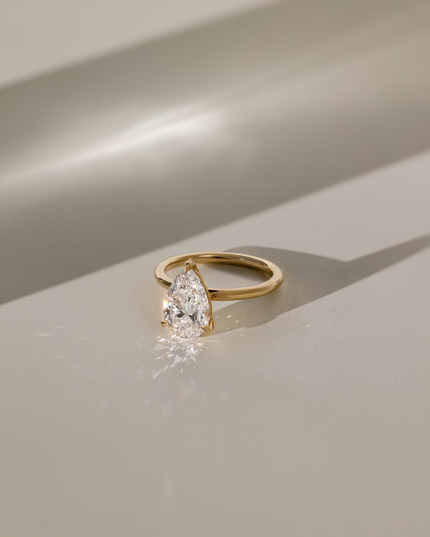 Amy - Pear Claw Solitaire Engagement Ring - Rose Two-Tone - Lifestyle