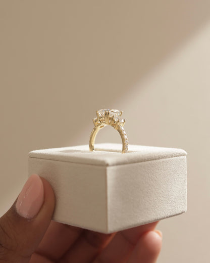 Meghan - Elongated Cushion Double Claw Trilogy with Round Side Stones, Pave Band and Cathedral Setting Engagement Ring - Platinum