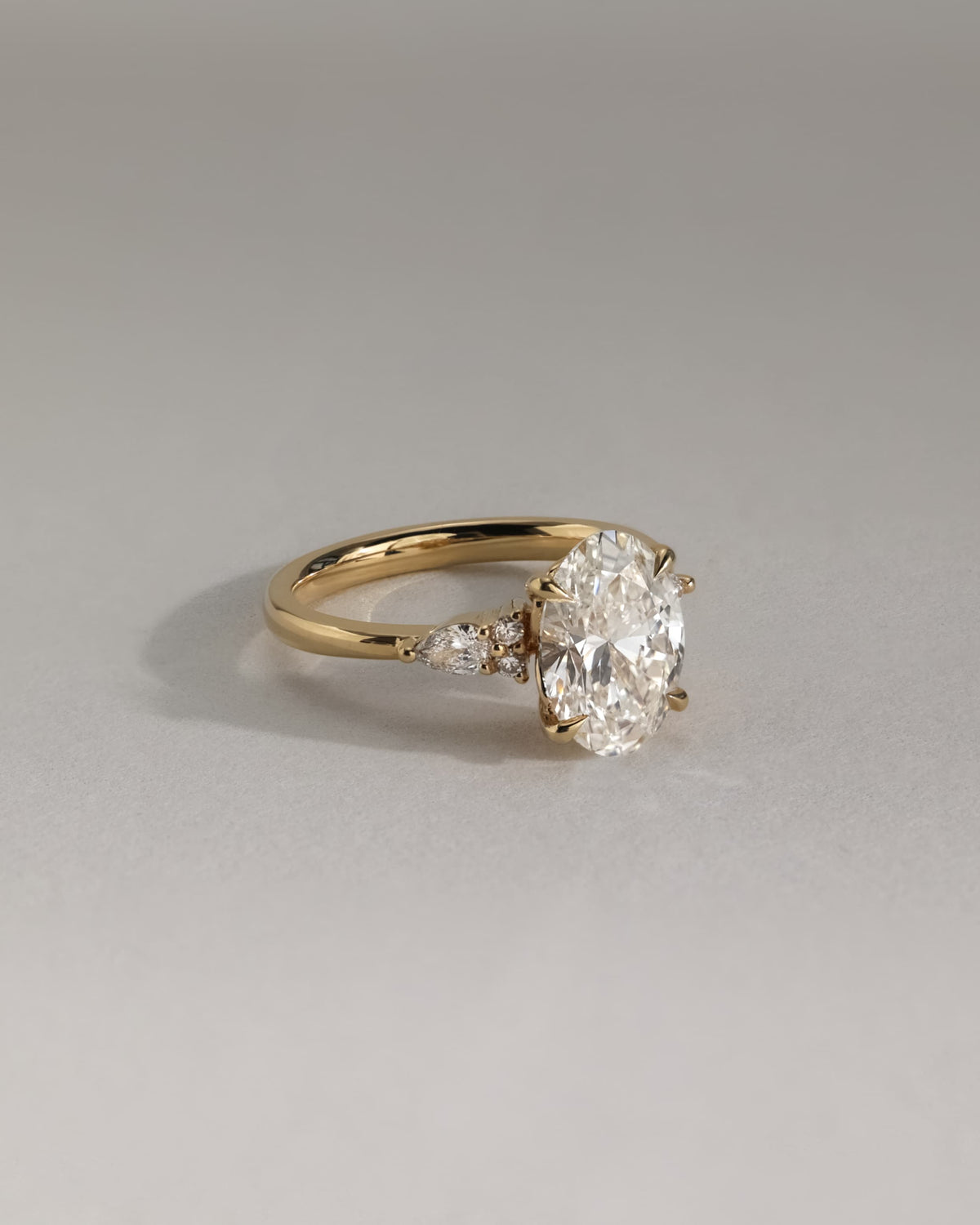 Sheridan - Oval Claw Solitaire with Pear Accents and Round Shoulder Stones Engagement Ring - Rose Gold