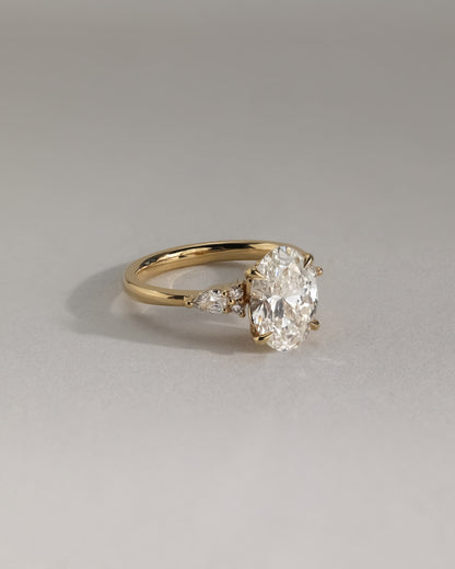 Sheridan - Oval Claw Solitaire with Pear Accents and Round Shoulder Stones Engagement Ring - Yellow Two-Tone