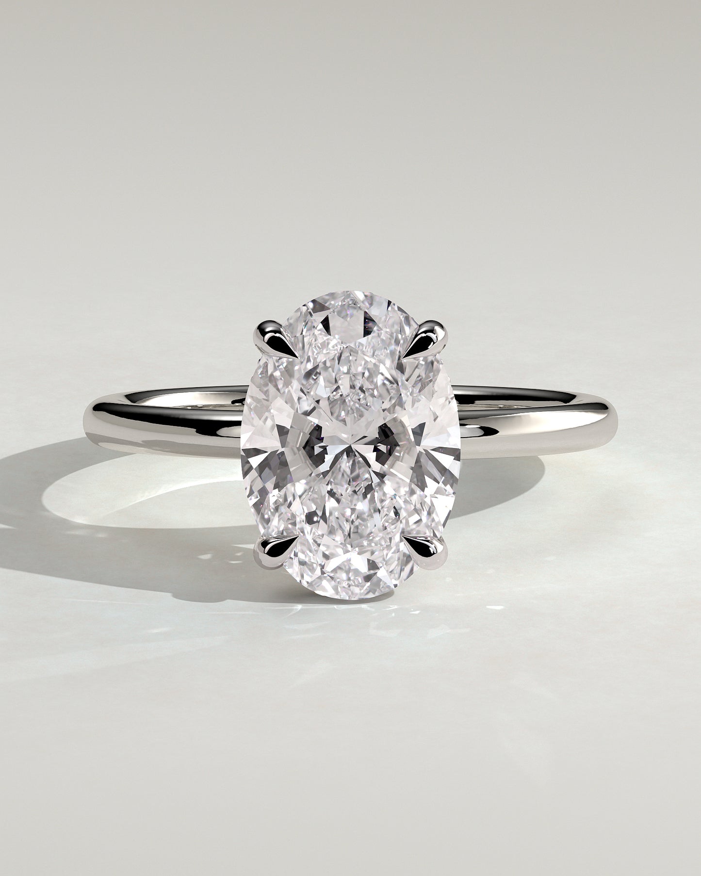 Emma - Classic Oval Claw Solitaire with Hidden Halo Engagement Ring - White Gold / Platinum - White Gold / Platinum