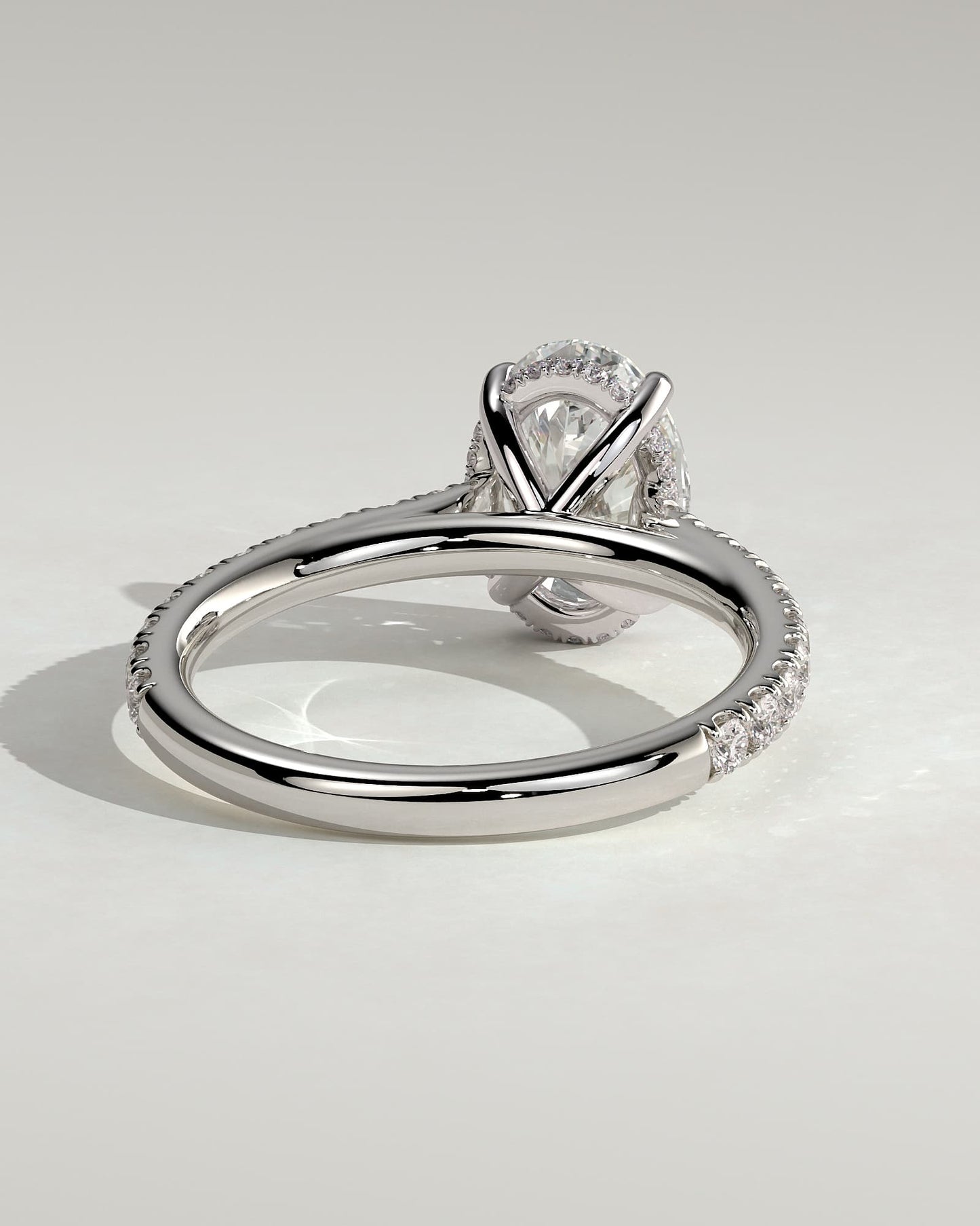 Julia - Oval Claw Solitaire with Hidden Halo, Pave Band and Cathedral High Setting Engagement Ring - White Gold