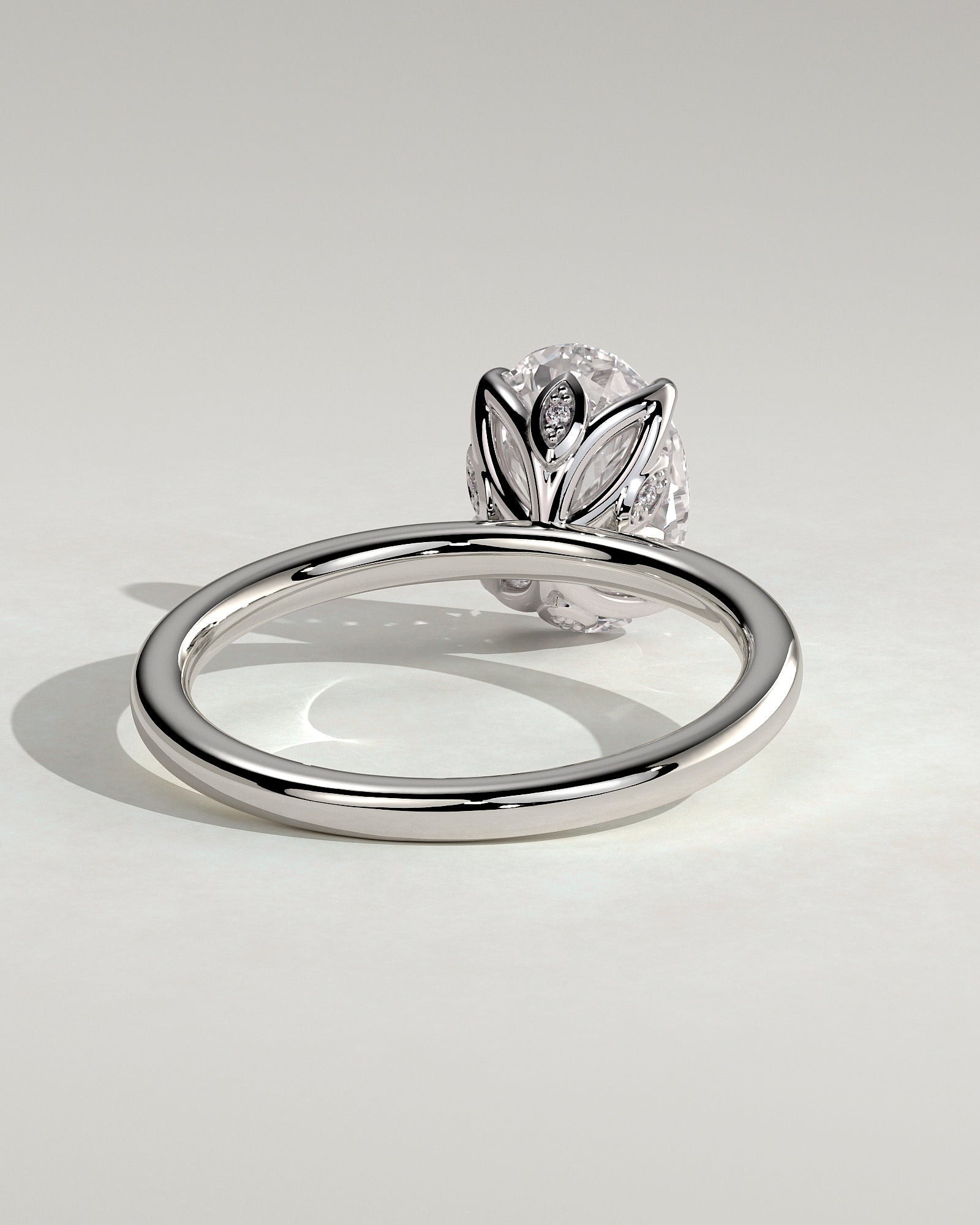 Aurelie - Oval Claw Solitaire with Petal Gallery and Accent Leaf Detail Engagement Ring - Platinum - White Gold / Platinum 2ct