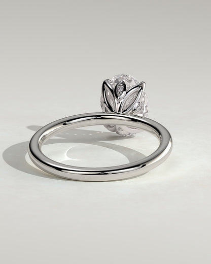 Aurelie - Oval Claw Solitaire with Petal Gallery and Accent Leaf Detail Engagement Ring - White Gold