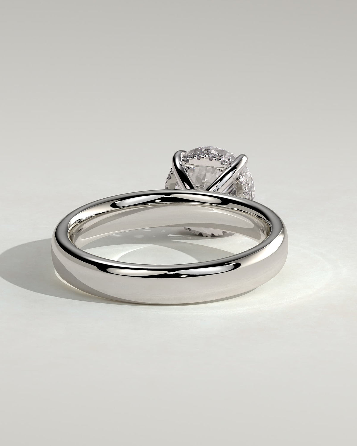 Kylie - Statement Round Claw Solitaire with Cigar Band and Hidden Halo Engagement Ring - Platinum