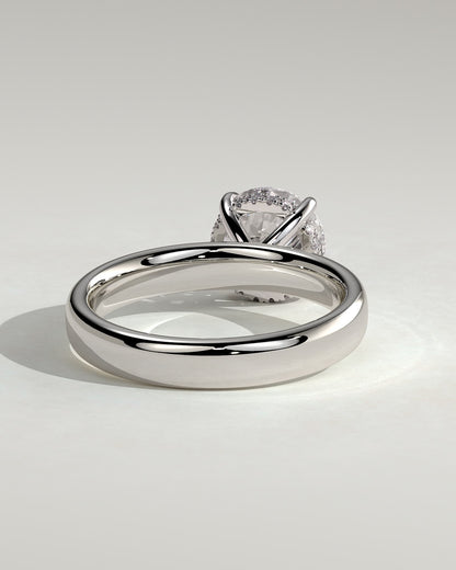 Kylie - Statement Round Claw Solitaire with Cigar Band and Hidden Halo Engagement Ring - Platinum