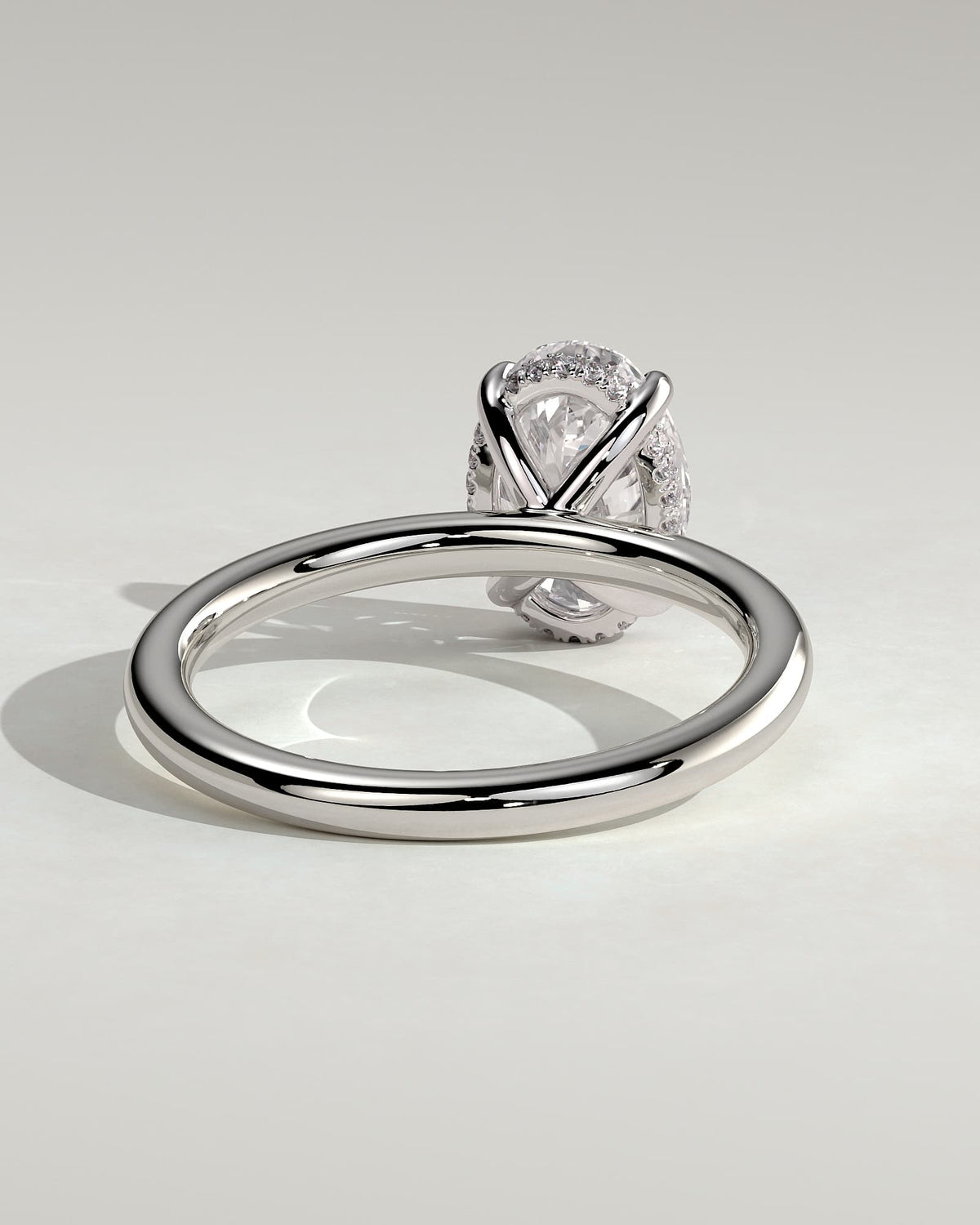 Emma - Classic Oval Claw Solitaire with Hidden Halo Engagement Ring - Platinum