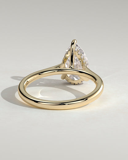 Courtney - Pear Claw Solitaire with Hidden Halo, Tapered Band and Cathedral High Setting Engagement Ring - Yellow Gold