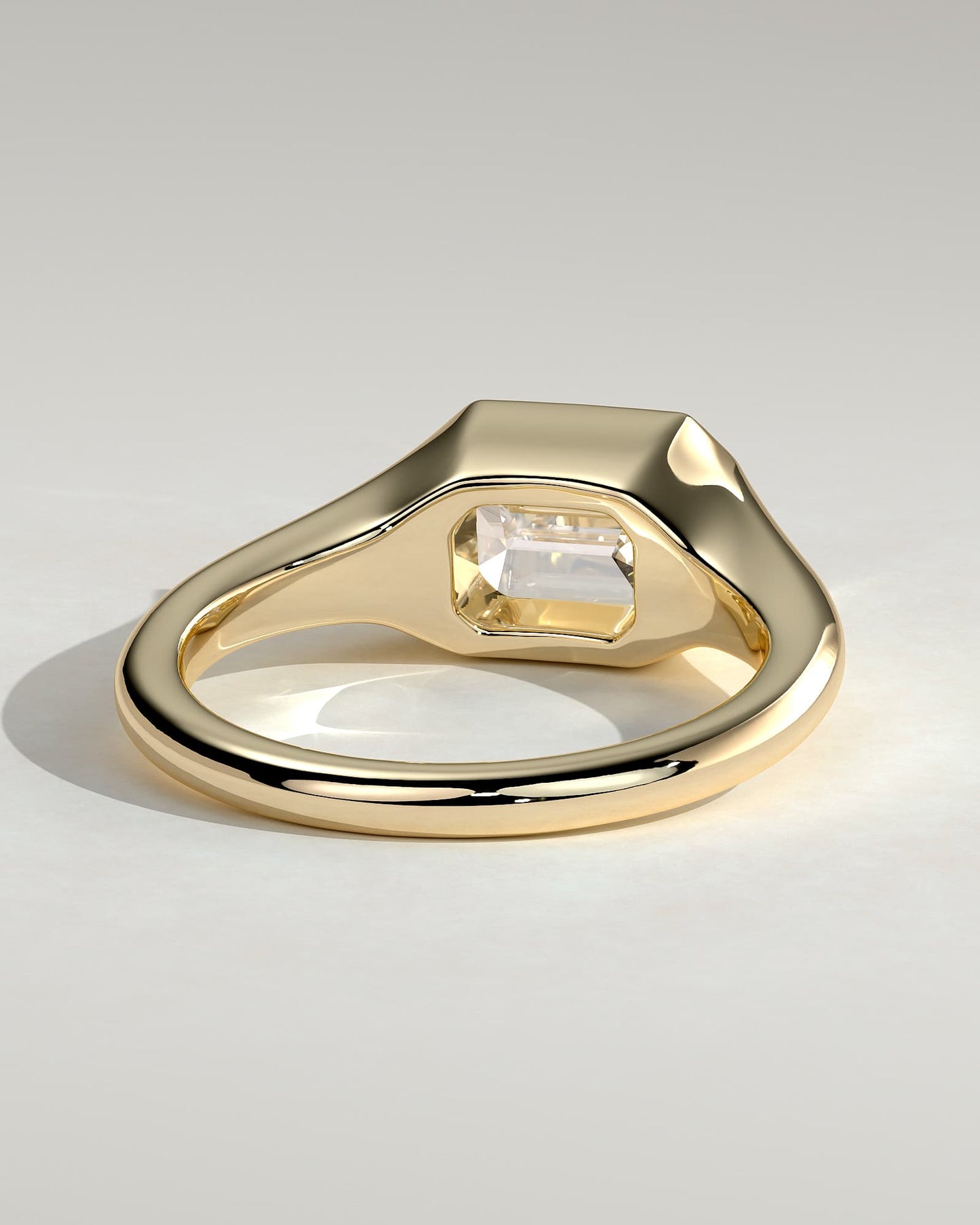 Montanah - Emerald East West Bezel Solitaire with Signet Band Engagement Ring - Yellow Gold