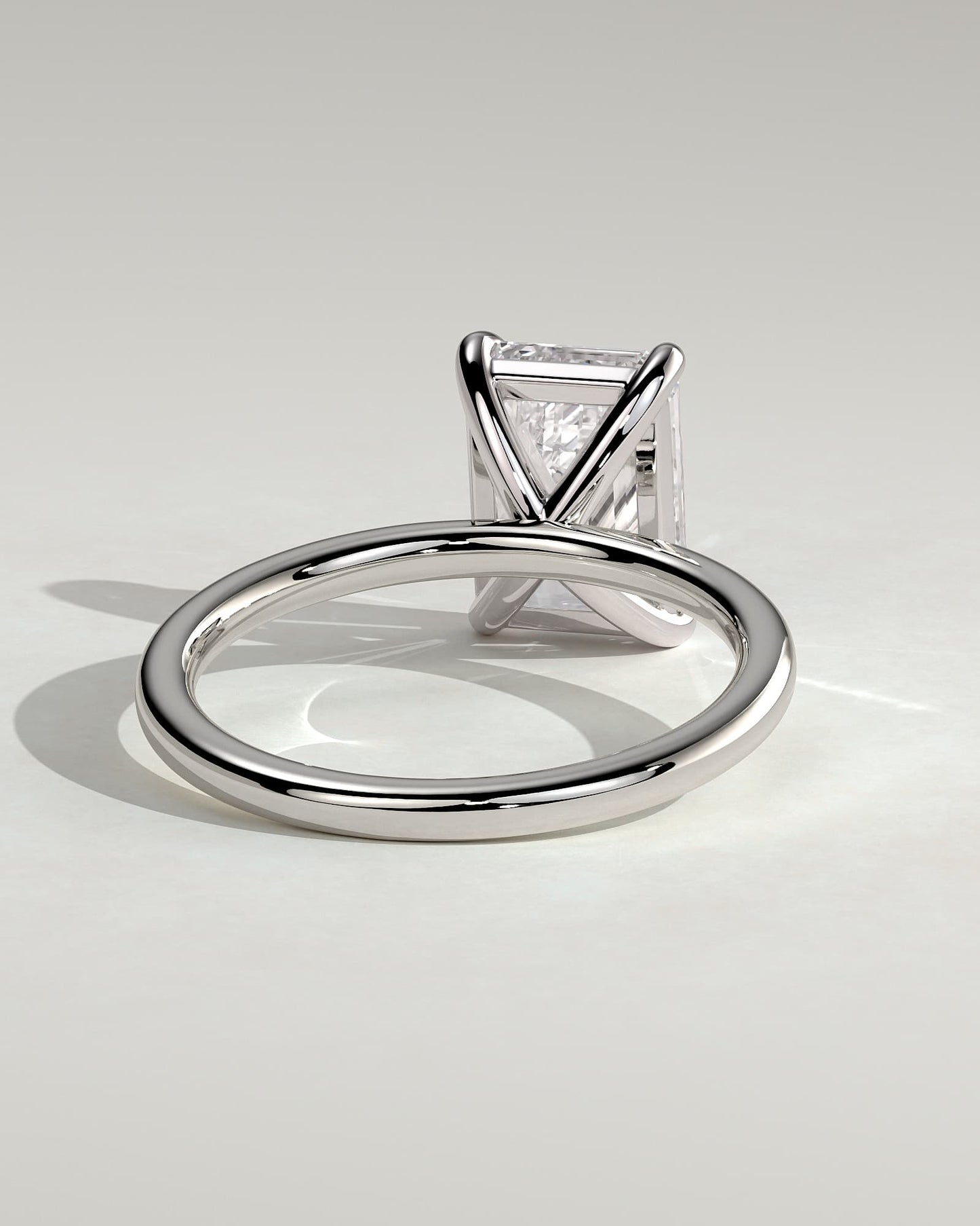 Alina - Emerald Claw Solitaire Engagement Ring - Platinum