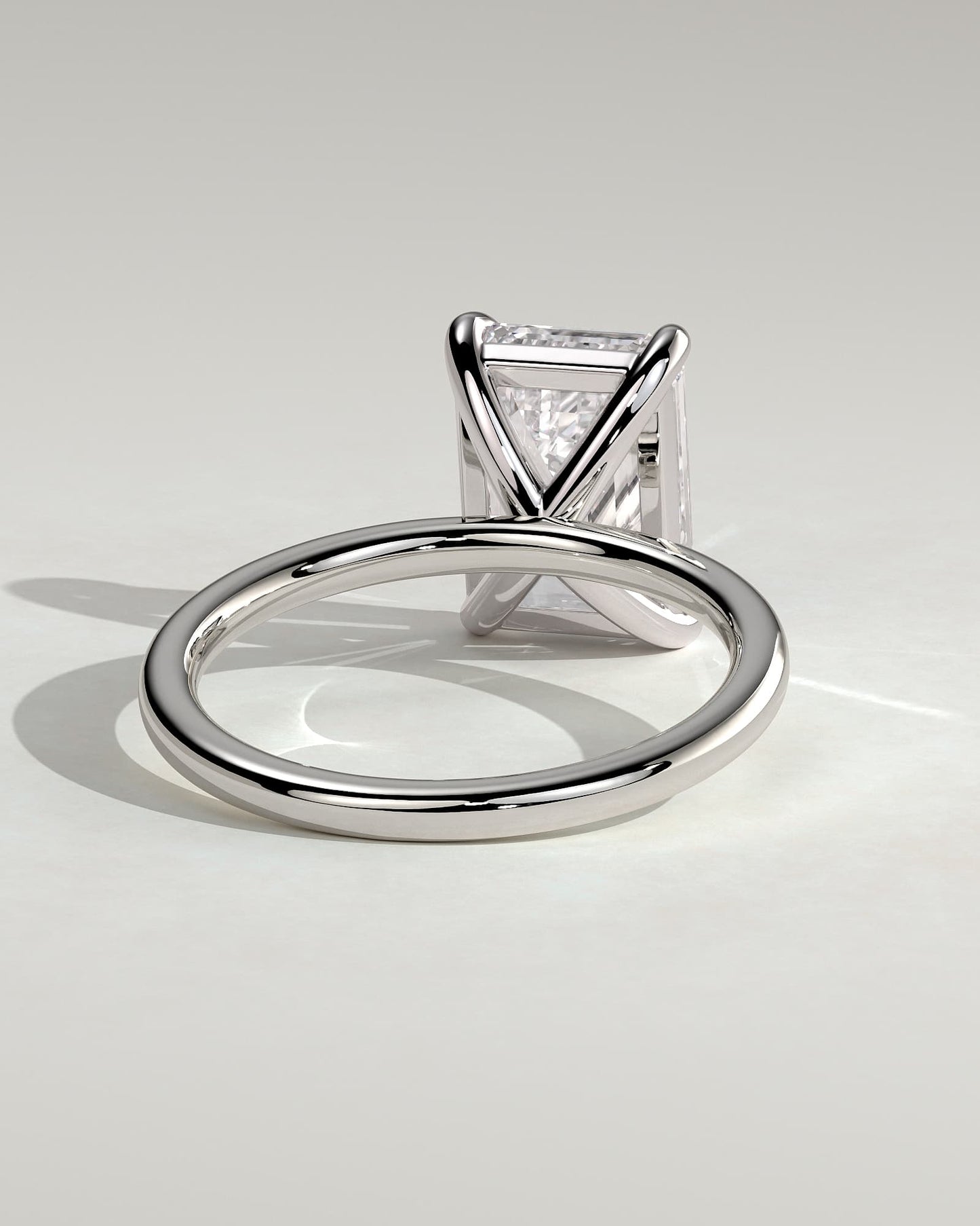 Alina - Emerald Claw Solitaire Engagement Ring - Platinum