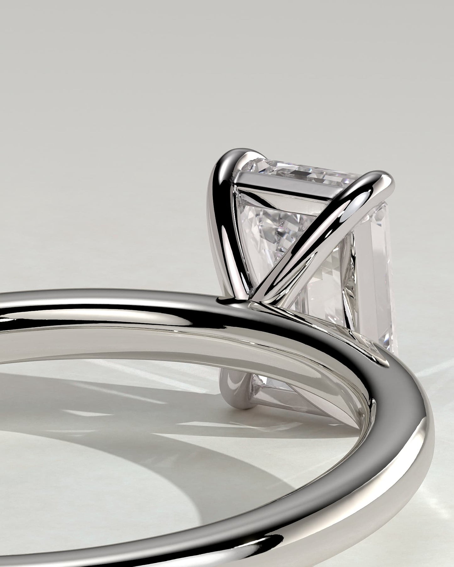 Alina - Emerald Claw Solitaire Engagement Ring - Platinum