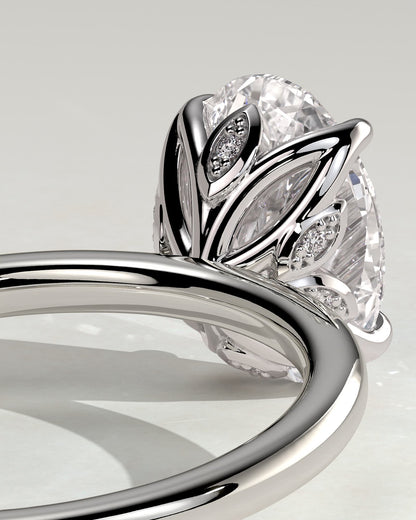 Aurelie - Oval Claw Solitaire with Petal Gallery and Accent Leaf Detail Engagement Ring - Platinum