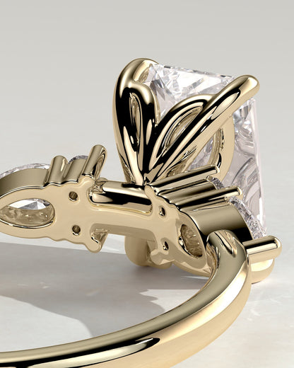 Heidi - Radiant Claw Solitaire with Pear Accents and Round Shoulder Stones Engagement Ring - Yellow Gold