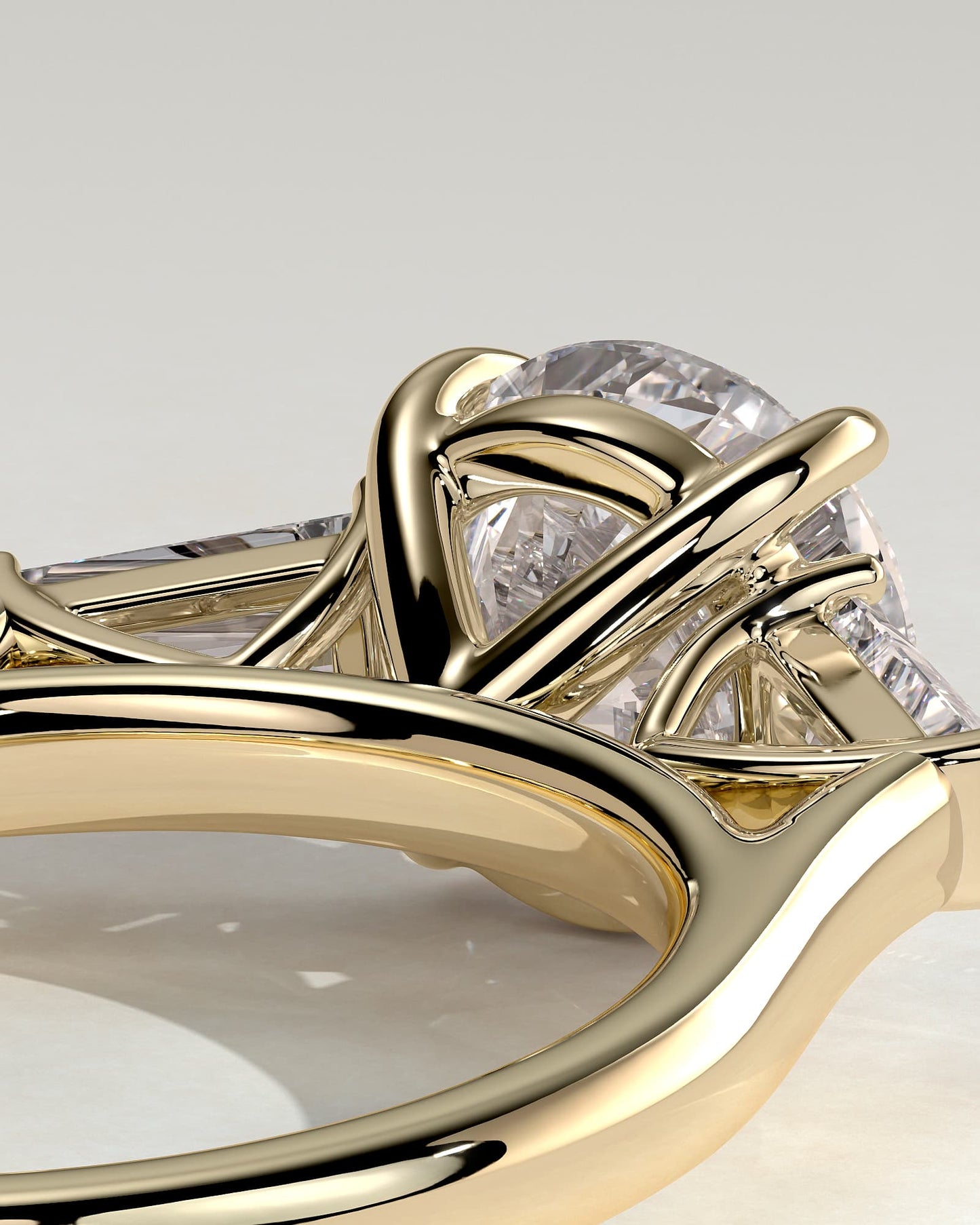 Marina - Round Claw Trilogy with Tapered Baguette Side Stones and Cathedral Setting Engagement Ring - Yellow Gold