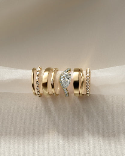 Eliza - Pear Claw Solitaire with Bead Set Pave Wave Band and East West Setting Engagement Ring - Yellow Gold