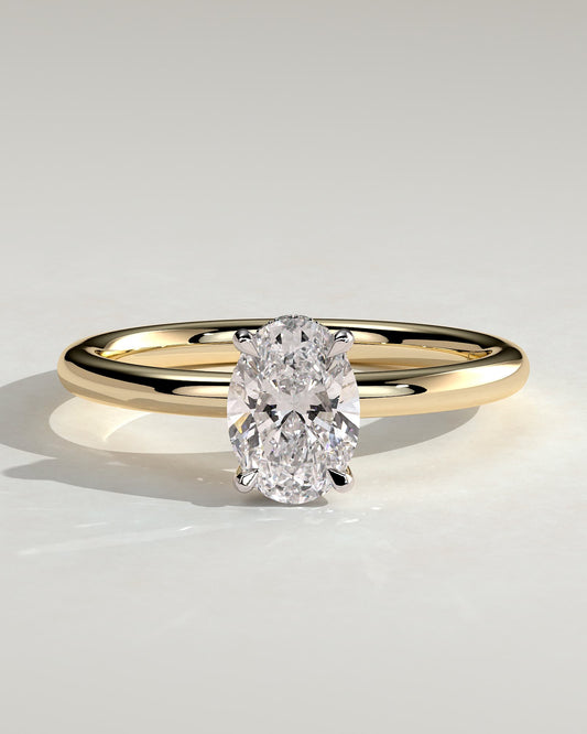 Emma - Classic Oval Claw Solitaire with Hidden Halo Engagement Ring - Yellow Two-Tone