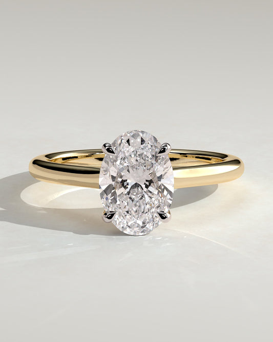 Hilary - Oval Claw Solitaire with Cathedral High Setting Engagement Ring - Yellow Two-Tone