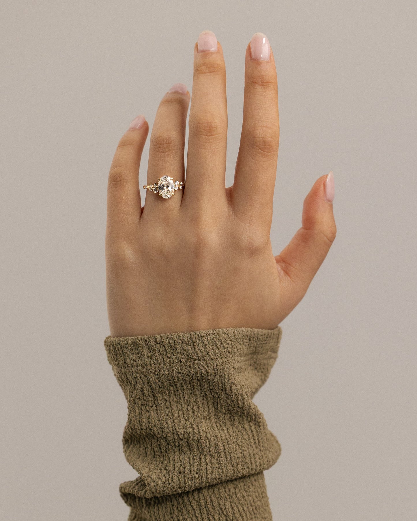 Bella - Oval Claw Solitaire with Clustered Round Shoulder Stones Engagement Ring - White Gold
